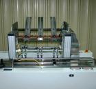 Used Streamfeeder Reciprocating Feeder, Model 8P-224. Has three lane coupon/tray denester magazine. Last used to fit product on infeed of Conflex shrink wrapper.