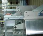 Used Streamfeeder Reciprocating Feeder, Model 8P-224. Has three lane coupon/tray denester magazine. Last used to fit product on infeed of Conflex shrink wrapper.