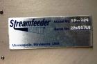 Used Streamfeeder Reciprocating Feeder, Model 8P-224. Has three lane coupon/tray denester magazine. Last used to fit product on infeed of Conflex shrink wrapper.