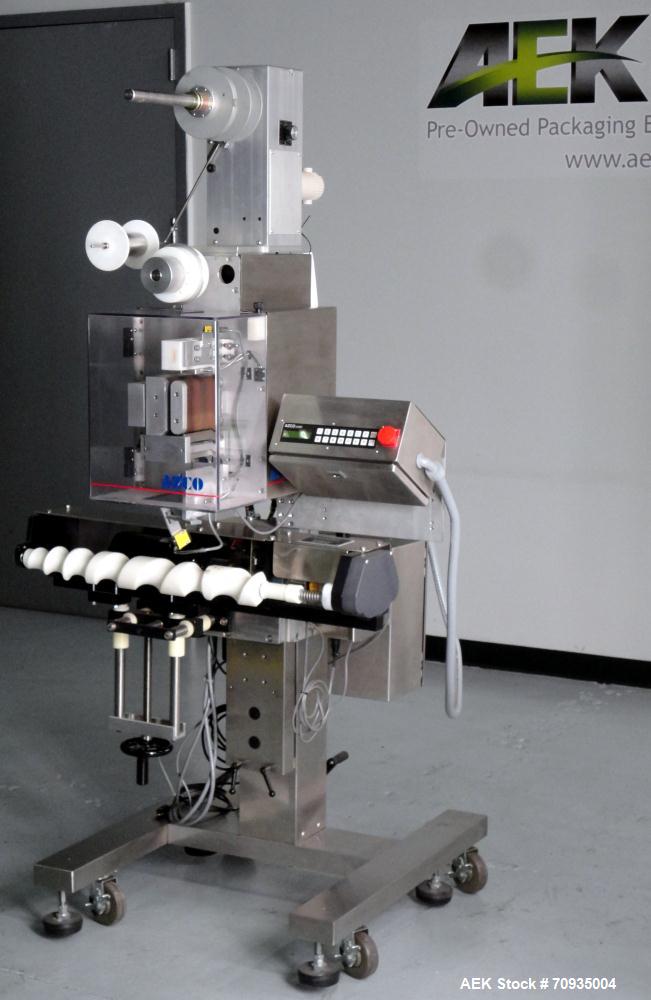 Used AZCO model SP-110 Sur-Pak Desiccant pouch dispenser. Rated speeds up to 200 cuts/minute, depending on size of pouch. Designed for pre-made pouches with a size range:  up to 4" max web width, up ...