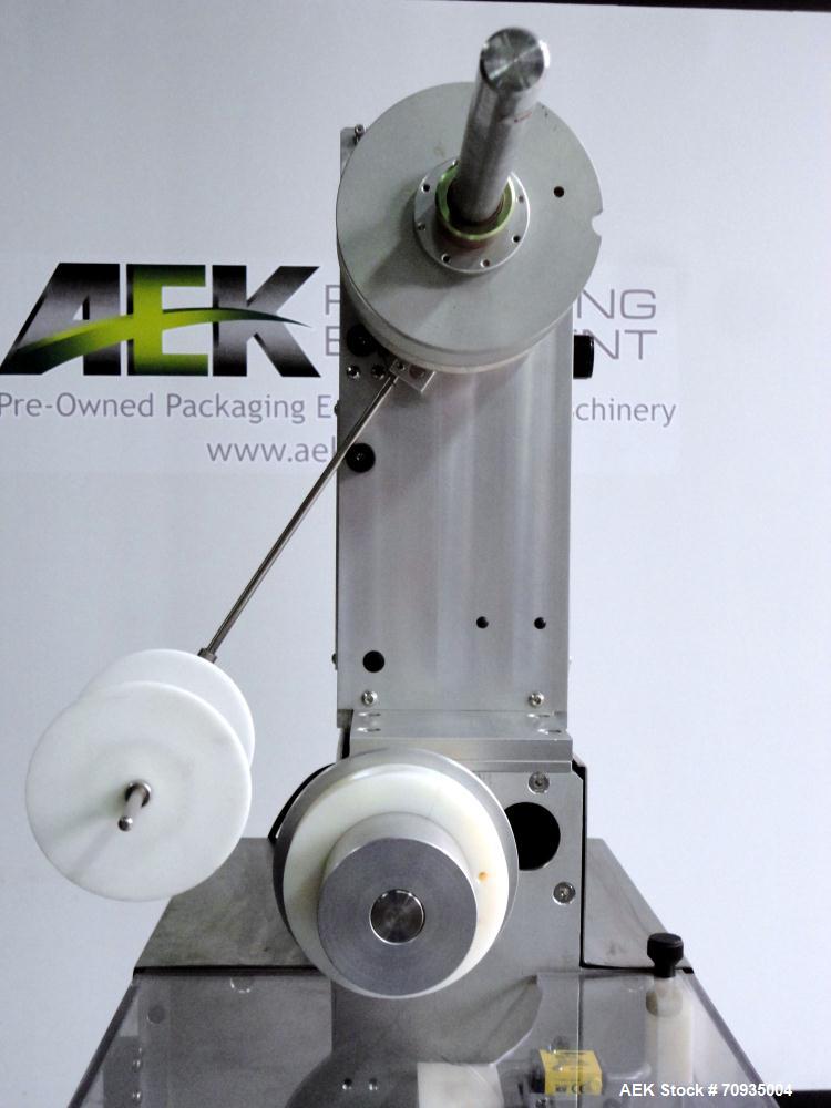 Used AZCO model SP-110 Sur-Pak Desiccant pouch dispenser. Rated speeds up to 200 cuts/minute, depending on size of pouch. Designed for pre-made pouches with a size range:  up to 4" max web width, up ...