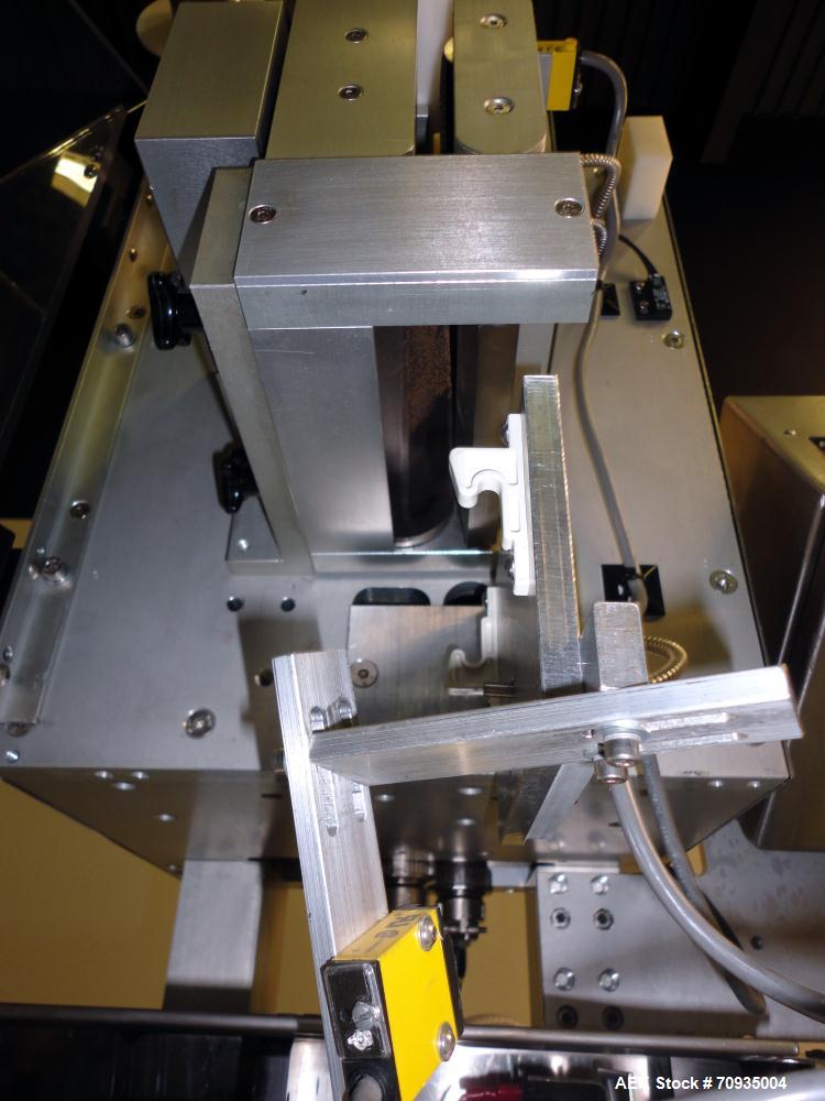 Used AZCO model SP-110 Sur-Pak Desiccant pouch dispenser. Rated speeds up to 200 cuts/minute, depending on size of pouch. Designed for pre-made pouches with a size range:  up to 4" max web width, up ...