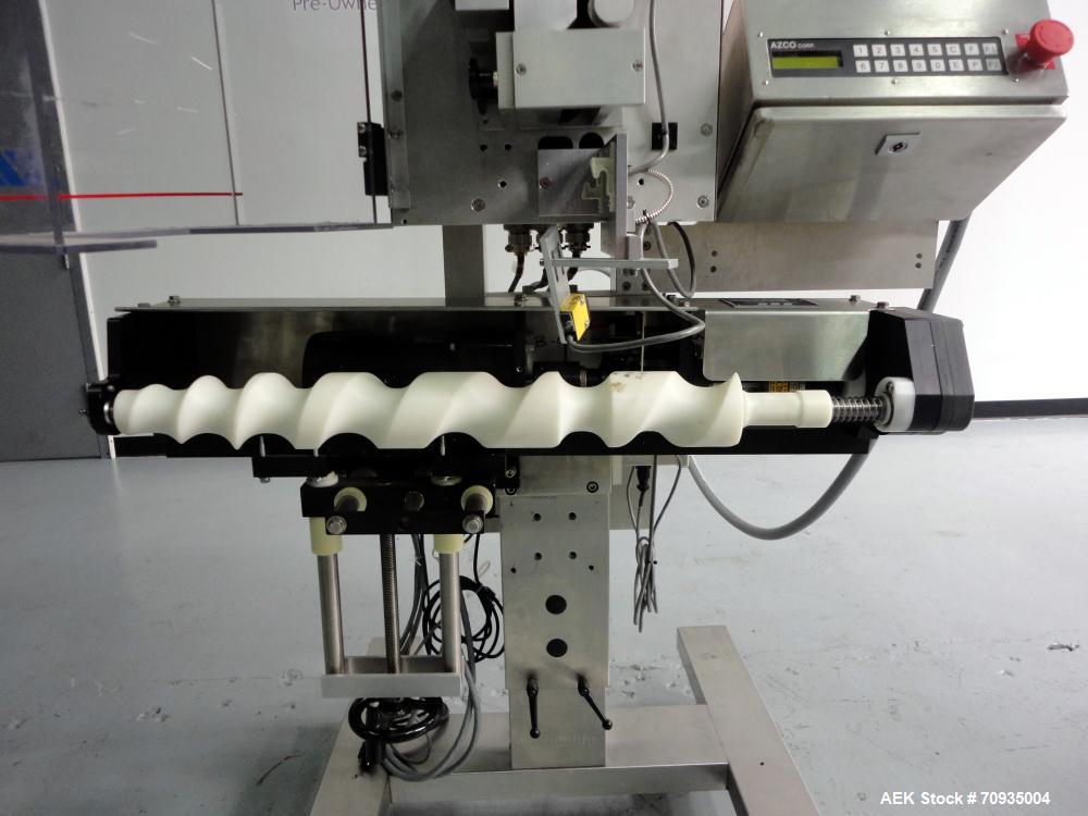 Used AZCO model SP-110 Sur-Pak Desiccant pouch dispenser. Rated speeds up to 200 cuts/minute, depending on size of pouch. Designed for pre-made pouches with a size range:  up to 4" max web width, up ...
