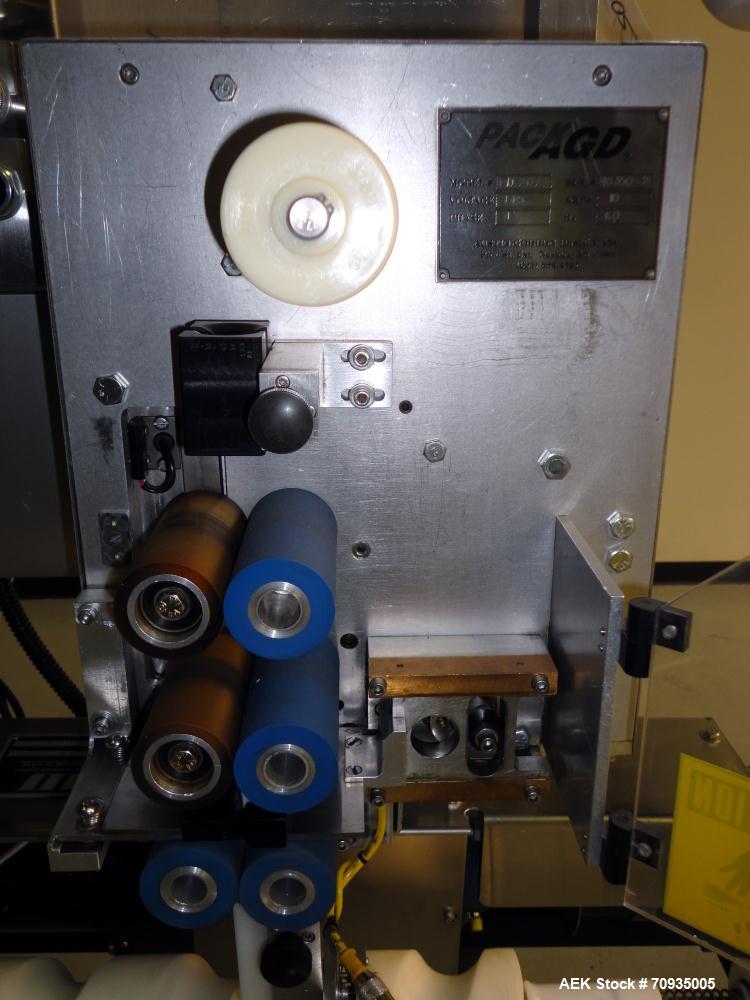 Used Austin Gordon Model PD-202 Desiccant / Pouch Feeder. Machine is rated at speeds up to 245 ppm, depending on size of pouch. Designed for pre-made pouches with a size range: Length 3/4" - 3 1/2", ...