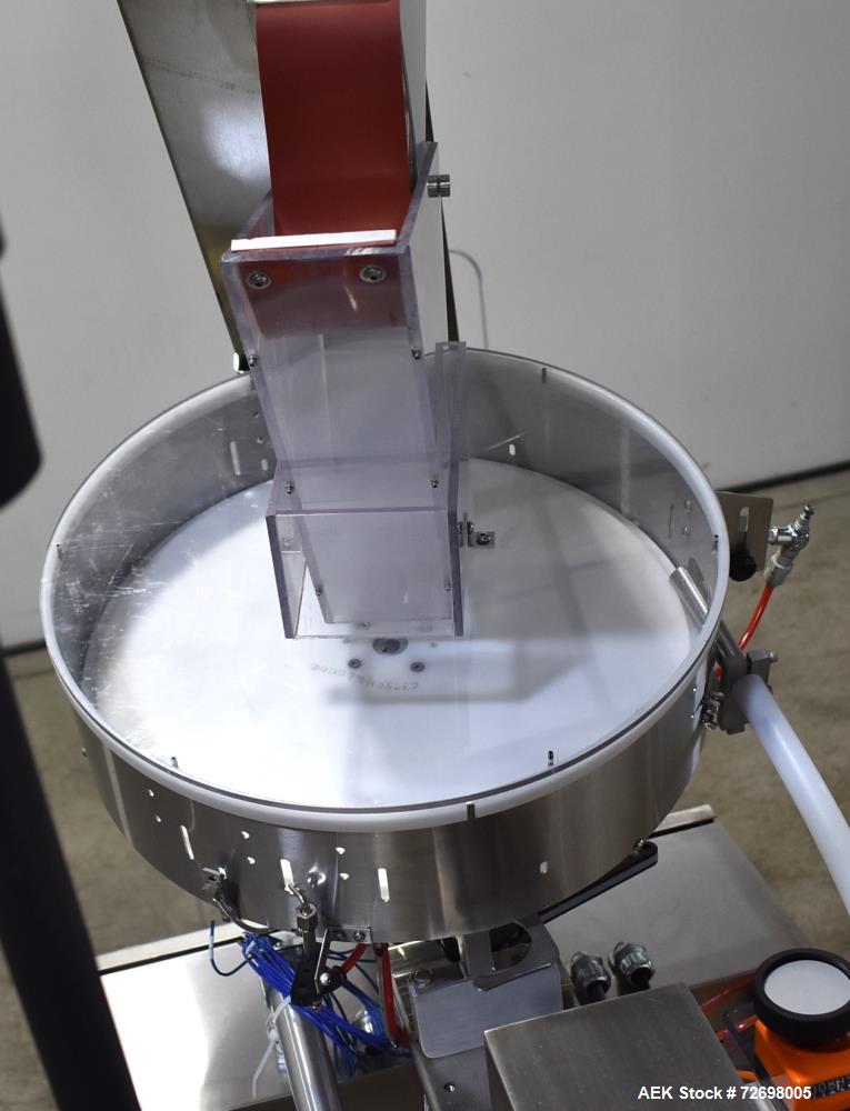 Used Omega Design Model CDFS-1.501 Canister Desiccant Feeder With Shuttle Dispenser. Machine is capable of speeds up to 400 bottles per minute (single-drop) and 300 bottles per minute (double-drop). ...