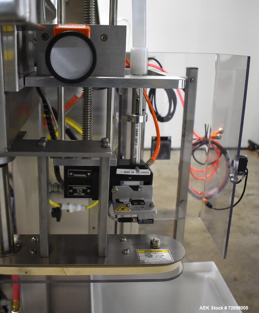 Used Omega Design Model CDFS-1.501 Canister Desiccant Feeder With Shuttle Dispenser. Machine is capable of speeds up to 400 bottles per minute (single-drop) and 300 bottles per minute (double-drop). ...