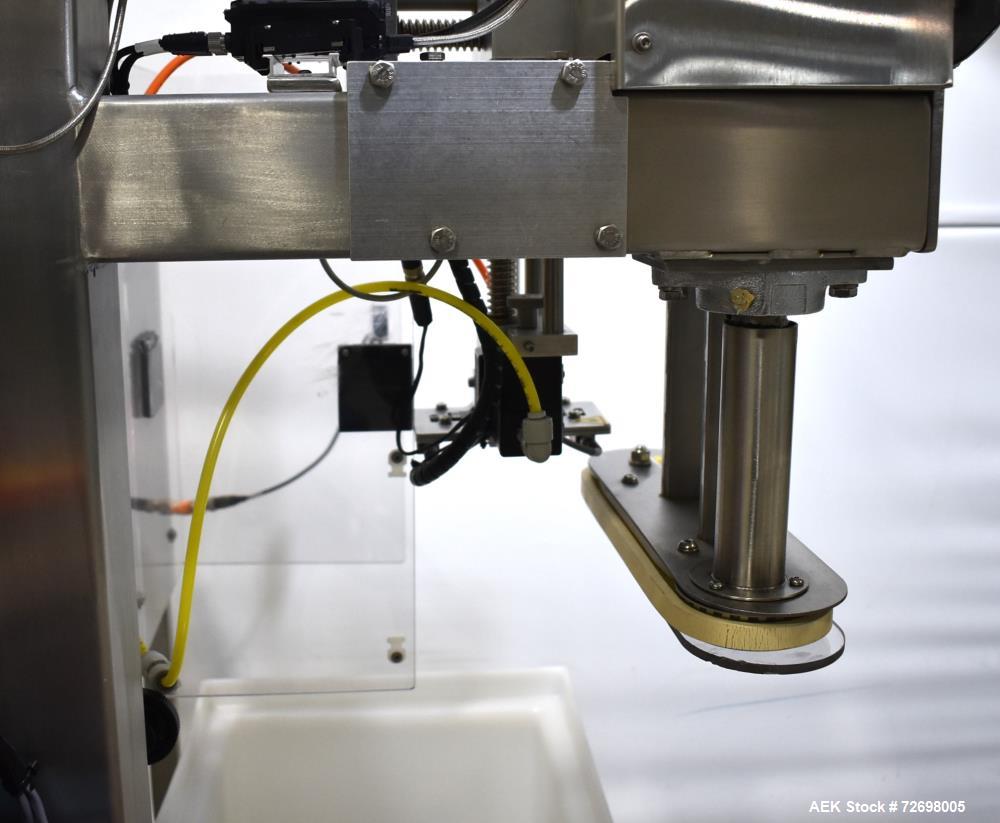 Used Omega Design Model CDFS-1.501 Canister Desiccant Feeder With Shuttle Dispenser. Machine is capable of speeds up to 400 bottles per minute (single-drop) and 300 bottles per minute (double-drop). ...