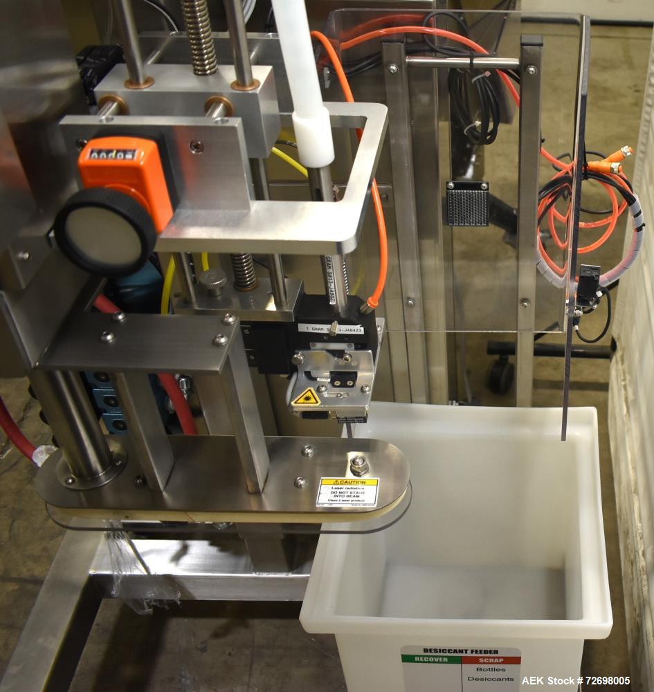 Used Omega Design Model CDFS-1.501 Canister Desiccant Feeder With Shuttle Dispenser. Machine is capable of speeds up to 400 bottles per minute (single-drop) and 300 bottles per minute (double-drop). ...