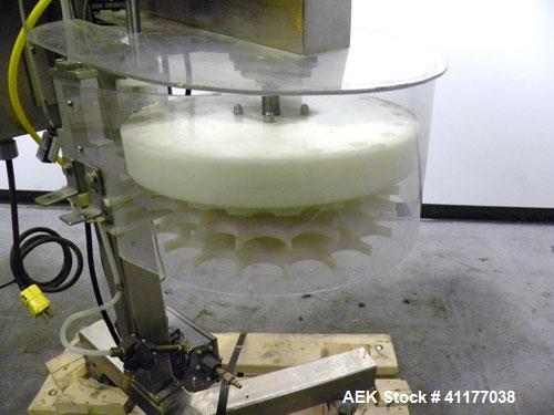 Used Omega Design Desiccant Feeder, Model DF-1. Capable of speeds up to 200 BPM. Continuous motion unit with star wheel indexing, can handle 1, 2 or 3 gram canisters with correct changeparts. Current...
