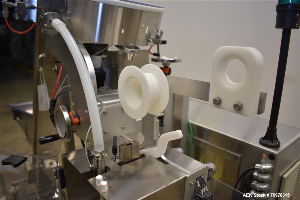 Used Omega Design Omni Feeder Combination Canister Desiccant Feeder. Capable of speeds up to 600 CPM (Single Drop) or 300 CPM (Double Drop). Servo operation, Allen Bradley PLC with integrated touch s...
