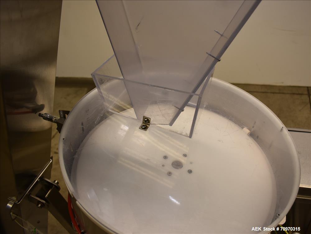 Used Omega Design Omni Feeder Combination Canister Desiccant Feeder. Capable of speeds up to 600 CPM (Single Drop) or 300 CPM (Double Drop). Servo operation, Allen Bradley PLC with integrated touch s...