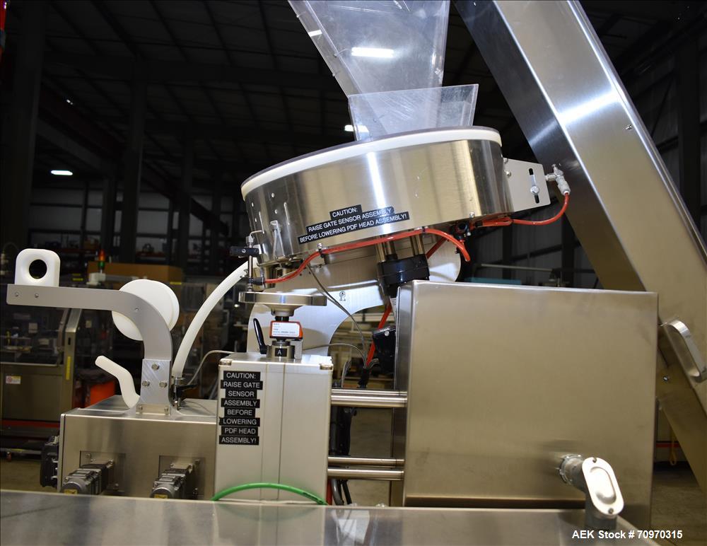 Used Omega Design Omni Feeder Combination Canister Desiccant Feeder. Capable of speeds up to 600 CPM (Single Drop) or 300 CPM (Double Drop). Servo operation, Allen Bradley PLC with integrated touch s...