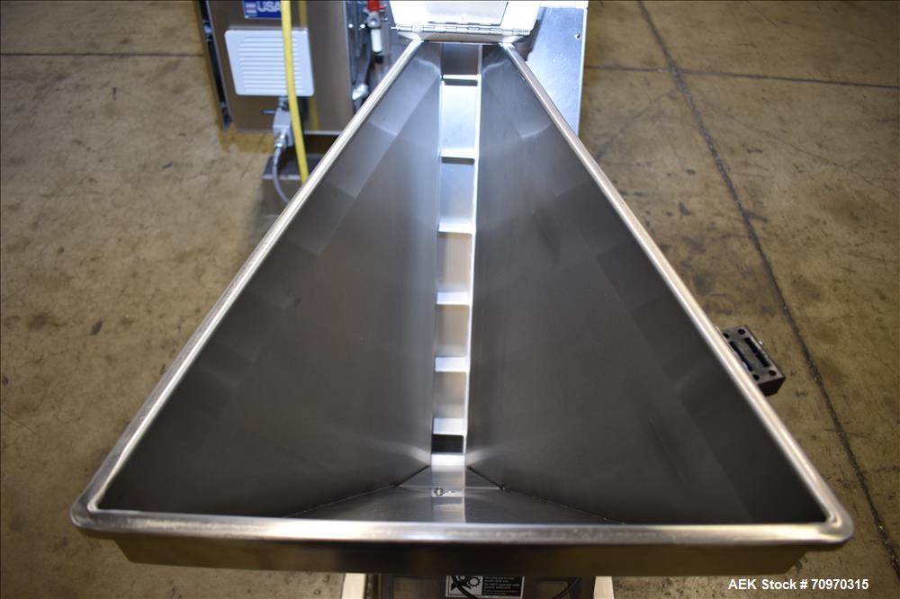 Used Omega Design Omni Feeder Combination Canister Desiccant Feeder. Capable of speeds up to 600 CPM (Single Drop) or 300 CPM (Double Drop). Servo operation, Allen Bradley PLC with integrated touch s...