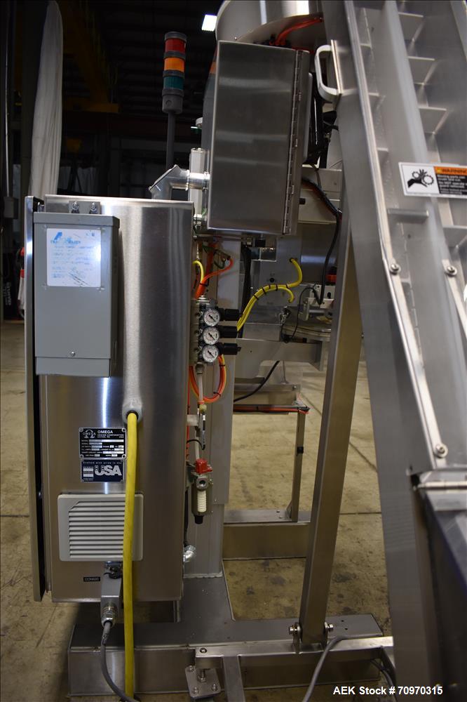 Used Omega Design Omni Feeder Combination Canister Desiccant Feeder. Capable of speeds up to 600 CPM (Single Drop) or 300 CPM (Double Drop). Servo operation, Allen Bradley PLC with integrated touch s...