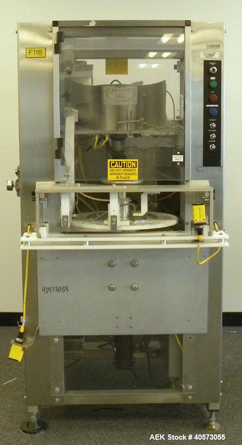 Used Palace Canister Desiccant Feeder, model P-DF. Capable of speeds up to 280 CPM on a single insertion. AB PLC controls. Integrated desiccant elevator feeder.