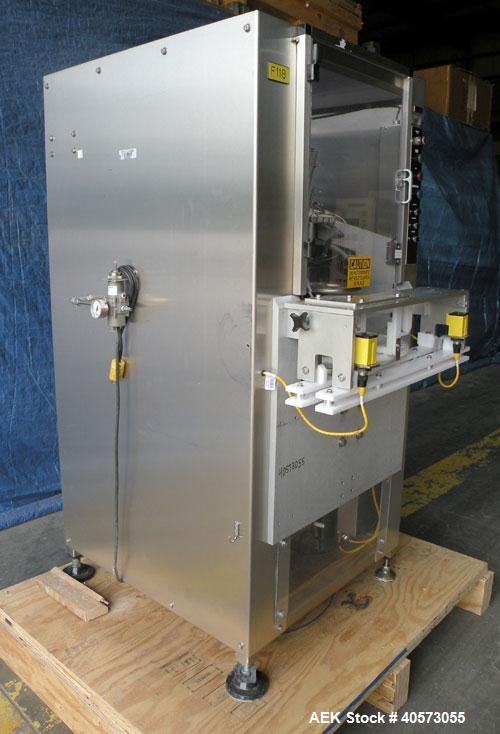 Used Palace Canister Desiccant Feeder, model P-DF. Capable of speeds up to 280 CPM on a single insertion. AB PLC controls. Integrated desiccant elevator feeder.