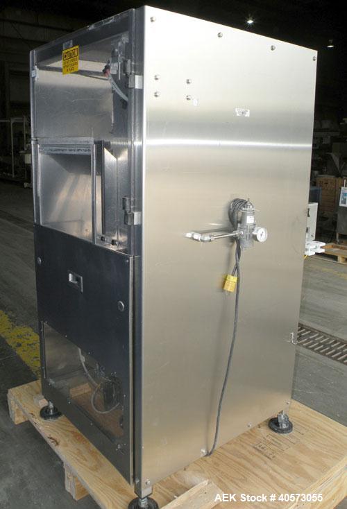 Used Palace Canister Desiccant Feeder, model P-DF. Capable of speeds up to 280 CPM on a single insertion. AB PLC controls. Integrated desiccant elevator feeder.