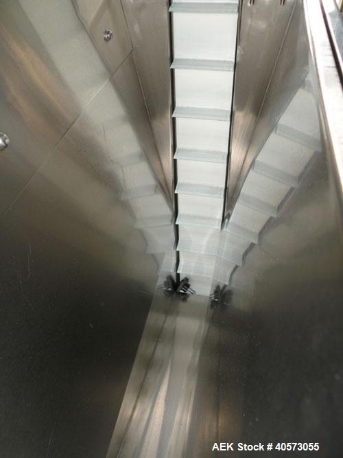 Used Palace Canister Desiccant Feeder, model P-DF. Capable of speeds up to 280 CPM on a single insertion. AB PLC controls. Integrated desiccant elevator feeder.