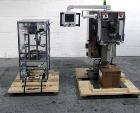 Used Active Pak Automation dessicant feeder, model APA2000, portable design, with infeed roll, 480 volt, 3 phase, serial# 2004167A, built 2004.