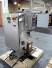 Used Active Pak Automation dessicant feeder, model APA2000, portable design, with infeed roll, 480 volt, 3 phase, serial# 2004167A, built 2004.