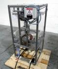 Used Active Pak Automation dessicant feeder, model APA2000, portable design, with infeed roll, 480 volt, 3 phase, serial# 2004167A, built 2004.