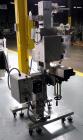 Used AZCO model SP-110 Sur-Pak Desiccant pouch dispenser. Rated speeds up to 200 cuts/minute, depending on size of pouch. Designed for pre-made pouches with a size range:  up to 4