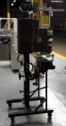 Used Austin Gordon Model PD-202 Desiccant / Pouch Feeder. Machine is rated at speeds up to 245 ppm, depending on size of pouch. Designed for pre-made pouches with a size range: Length 3/4