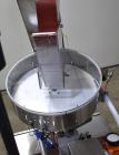 Used Omega Design Model CDFS-1.501 Canister Desiccant Feeder With Shuttle Dispenser. Machine is capable of speeds up to 400 bottles per minute (single-drop) and 300 bottles per minute (double-drop). ...