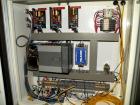 Used Palace Canister Desiccant Feeder, model P-DF. Capable of speeds up to 280 CPM on a single insertion. AB PLC controls. Integrated desiccant elevator feeder.