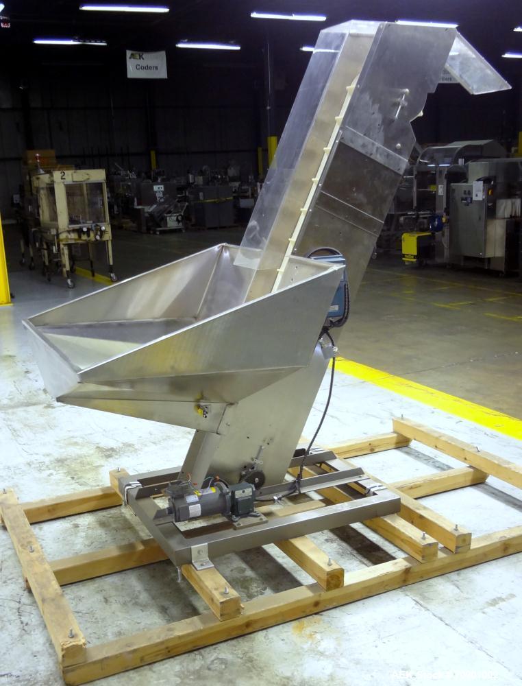 Used Incline Cleated Belt Conveyor, 304 Stainless Steel. 10-3/4" Wide X 75" long belt, with 2" tall cleats spaced approximate 6" apart. Hopper is 51" long x 44" wide x 34" deep. Unit driven by a 1/4 ...