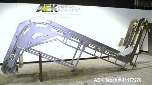 Used Allen Machinery Inclined "Z" Shaped Cleated BeltConveyor, Type BC, Model F7099-11. Rated to 5000 pounds an hour. Stainless steel frame. 18" wide x 4" tall cleated plastic belt on 8’’ centers. 60...