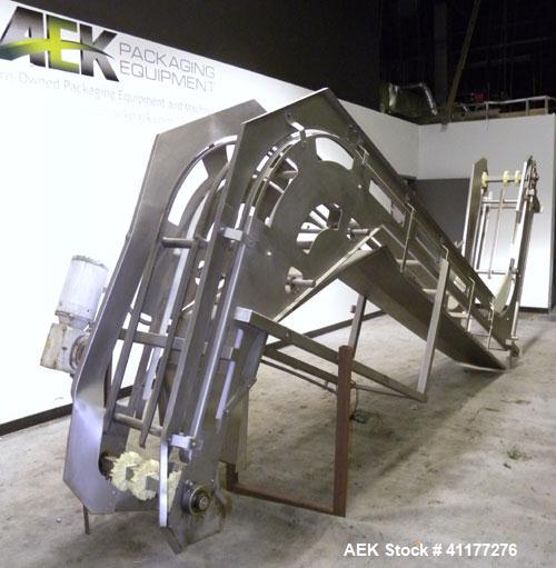 Used Allen Machinery Inclined "Z" Shaped Cleated BeltConveyor, Type BC, Model F7099-11. Rated to 5000 pounds an hour. Stainless steel frame. 18" wide x 4" tall cleated plastic belt on 8’’ centers. 60...