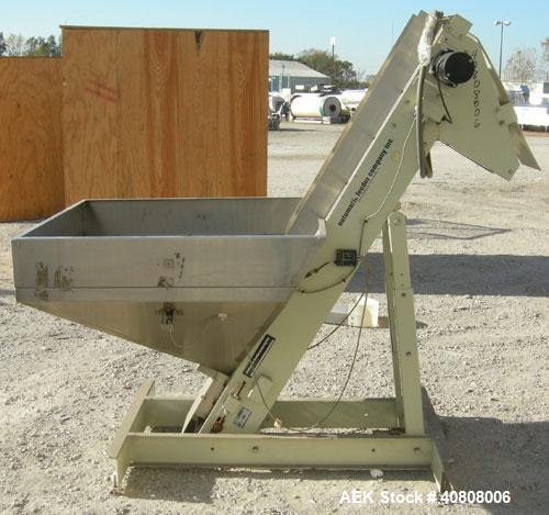 Used Hoppmann Elevating Prefeeder, model EP, Series 8, 304 stainless steel. 8" wide rubber belt with 2" pleats placed approximately 6" apart. Approximate 48" discharge height. 43 1/2" x 42" x 27" dee...
