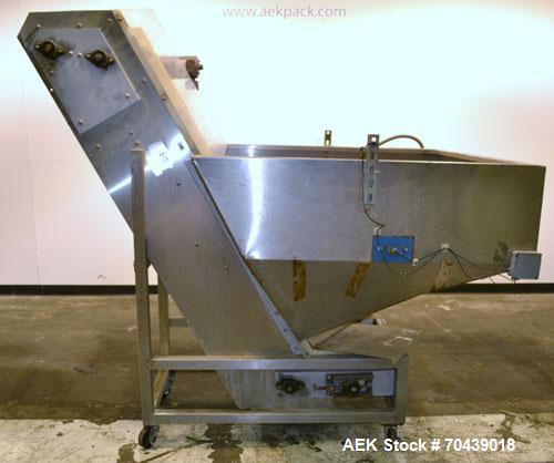 Used Stainless Steel New England Machinery Cap / Bottle  Elevator, Model H/E-60