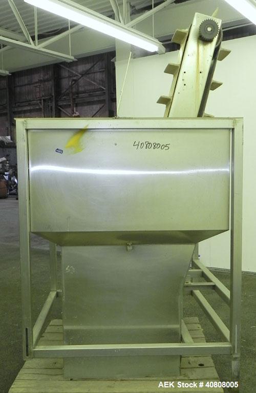 Used Cap Conveyor/Elevator, 304 Stainless Steel. 10" Wide rubber belt with 3" pleats placed approximately 8" apart. Approximate 86" discharge height. 44" x 44" x 35" deep hopper with bolt on plastic ...