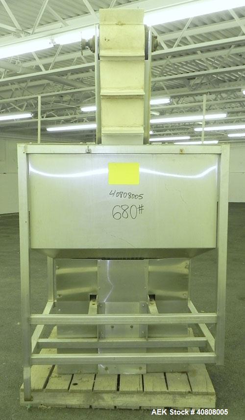 Used Cap Conveyor/Elevator, 304 Stainless Steel. 10" Wide rubber belt with 3" pleats placed approximately 8" apart. Approximate 86" discharge height. 44" x 44" x 35" deep hopper with bolt on plastic ...