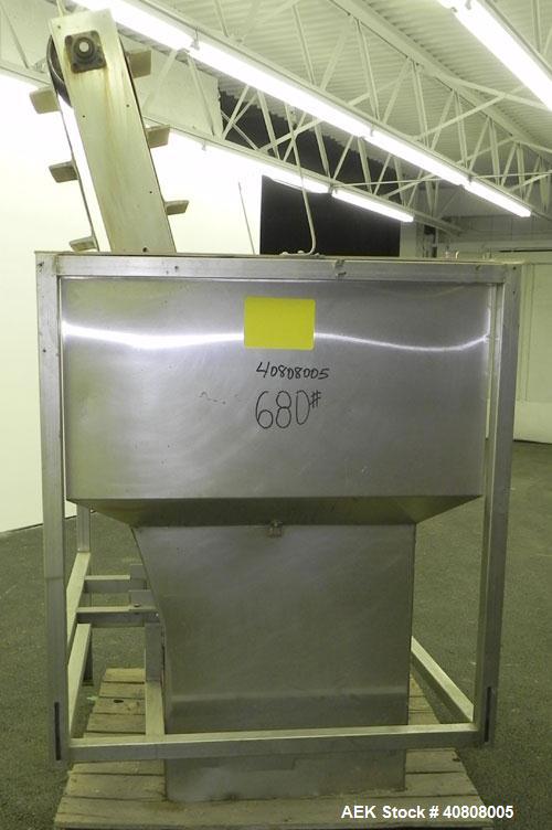 Used Cap Conveyor/Elevator, 304 Stainless Steel. 10" Wide rubber belt with 3" pleats placed approximately 8" apart. Approximate 86" discharge height. 44" x 44" x 35" deep hopper with bolt on plastic ...