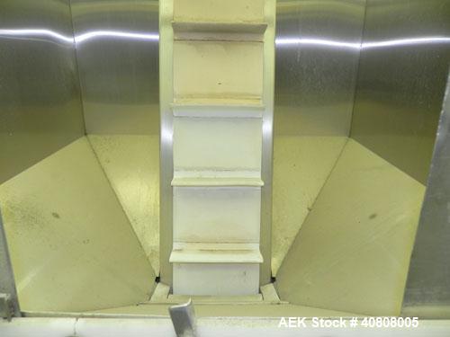 Used Cap Conveyor/Elevator, 304 Stainless Steel. 10" Wide rubber belt with 3" pleats placed approximately 8" apart. Approximate 86" discharge height. 44" x 44" x 35" deep hopper with bolt on plastic ...