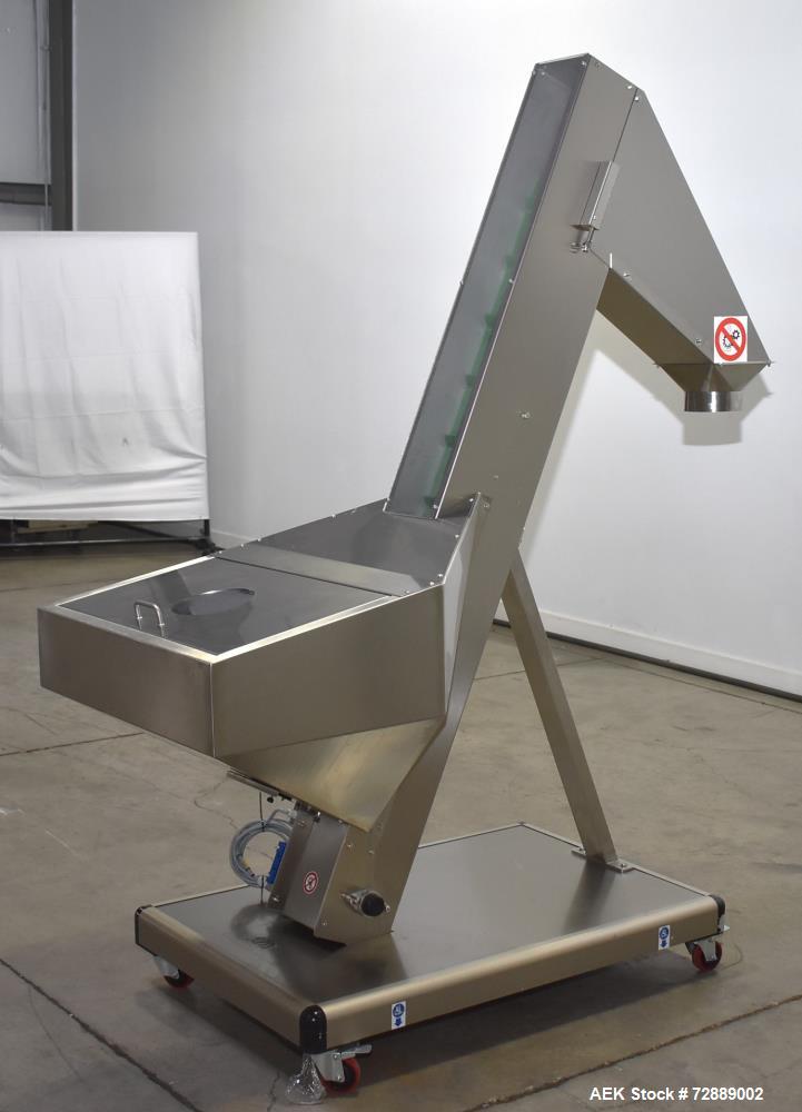 Used- SARG Incline Belt Conveyor. Stainless steel construction. Hopper. Cleated belt, approximate 8" wide x 5-1/2" center x ...
