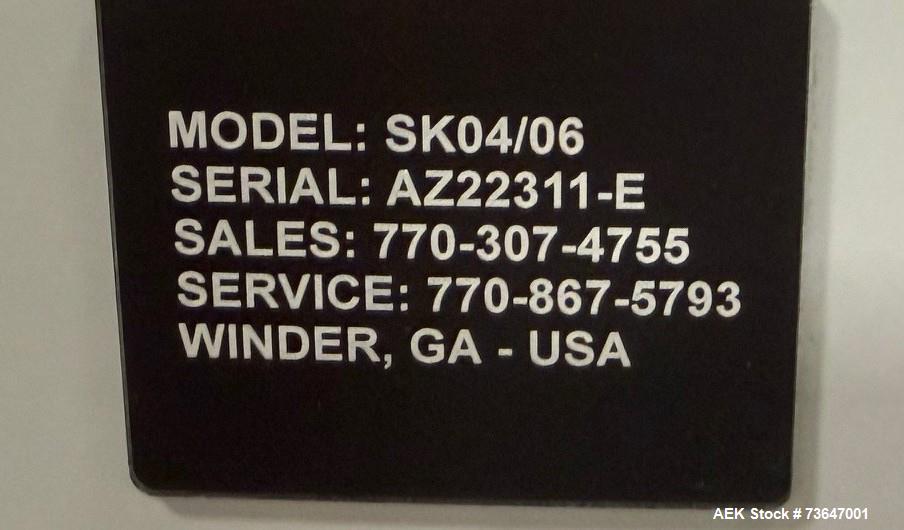 SureKap Elevator Model SK04/06 – Packaging Line Elevating Conveyor