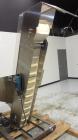 Used- Incline Cleated Belt Conveyor, 304 Stainless Steel. 10-3/4