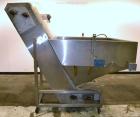 Used- Stainless Steel New England Machinery Cap / Bottle  Elevator, Model H/E-60