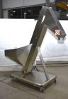 Used- SARG Incline Belt Conveyor. Stainless steel construction. Hopper. Cleated belt, approximate 8