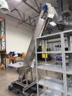 SureKap Elevator Model SK04/06 – Packaging Line Elevating Conveyor