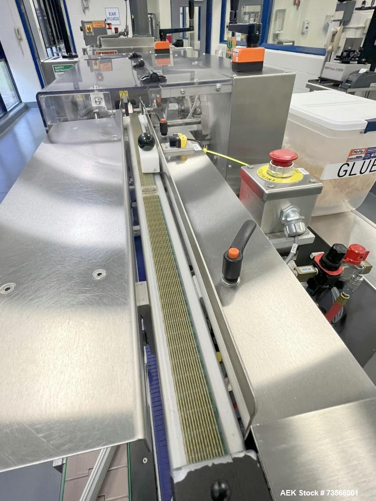 Used MGS Machine TopSerter II Rotary Pick & Place Coupon Feeder, Serial# 13189, Year 2008. With Nordson ProBlue 4 Glue System, vacuum pump, Allen-Bradley PanelView Plus HMI, 1/60/230V.