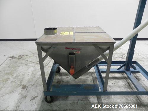 Used Flexicon Model Mobile Sanitary Flexible Screw Conveyor. Conveyor tubing is 3.5" diameter. Screw is driven by a 2 hp, 1140 rpm motor. Has 8 cubic foot hopper. Has 8' tall discharge height. Has st...