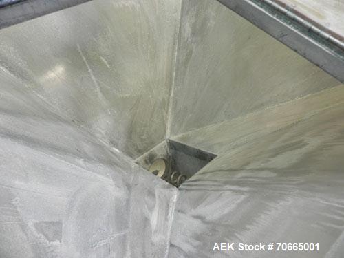Used Flexicon Model Mobile Sanitary Flexible Screw Conveyor. Conveyor tubing is 3.5" diameter. Screw is driven by a 2 hp, 1140 rpm motor. Has 8 cubic foot hopper. Has 8' tall discharge height. Has st...