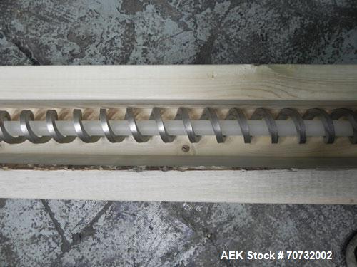 Used Flexicon Hollow Core Screw Feeder. 30" X 30" Hopper x 30" (depth). Tube has 2" (id) with a 1-3/4" (diam) screw X 142" (long).