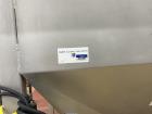 Used Flexicon Flexible Screw Feeder. Unit is currently installed.