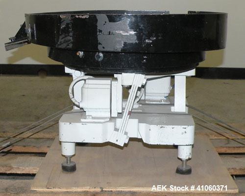 Used FMC Magnetic Parts Feeder, Model EB142. 22" diameter bowl. 60/230 Volt. Mounted on a carbon steel base.